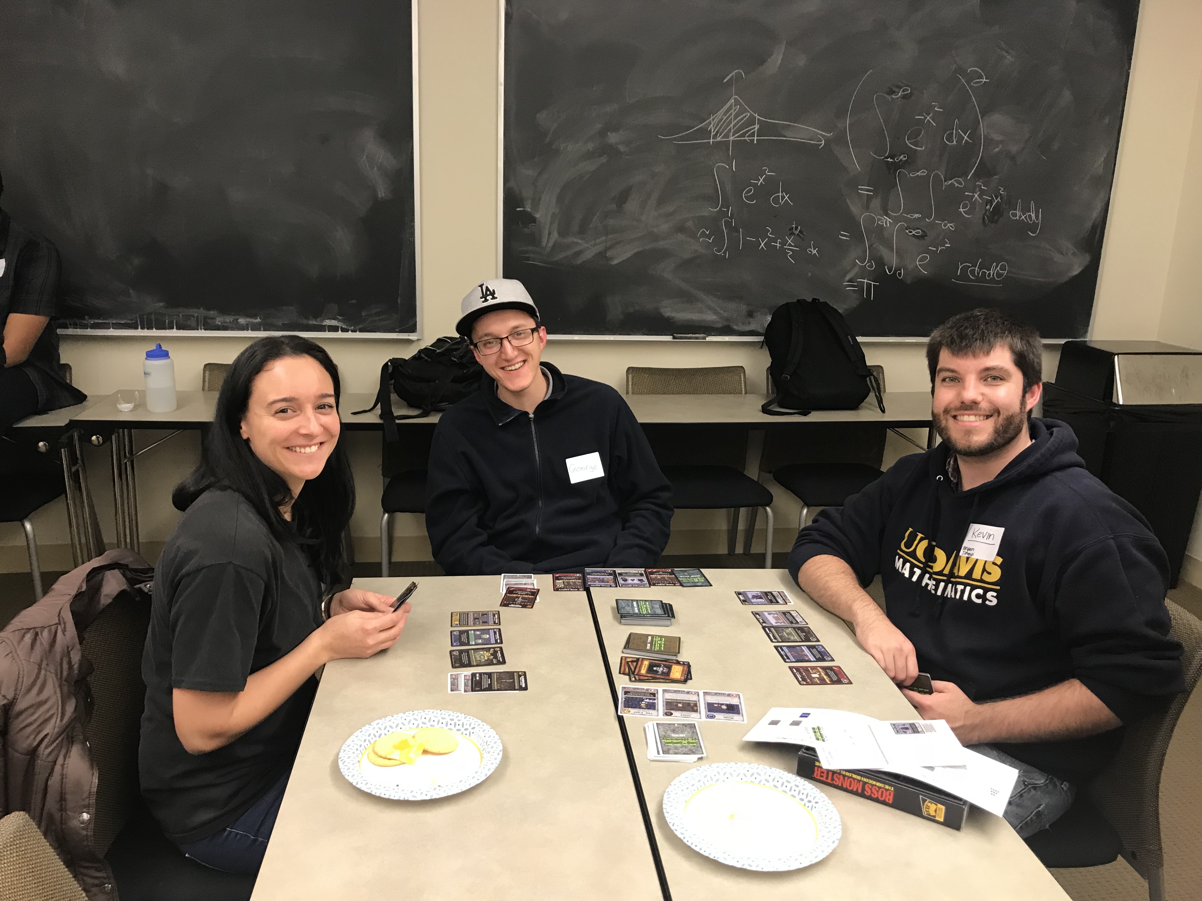  AWM members playing a card game at the 2018 Winter Social.